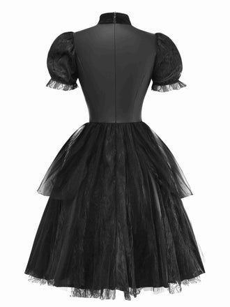 Robe noire en maille à manches bouffantes style vampire années 1950