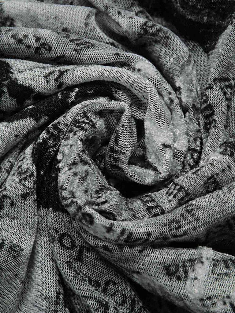 [Prévente] Robe noire en maille à imprimé journal licou années 1930