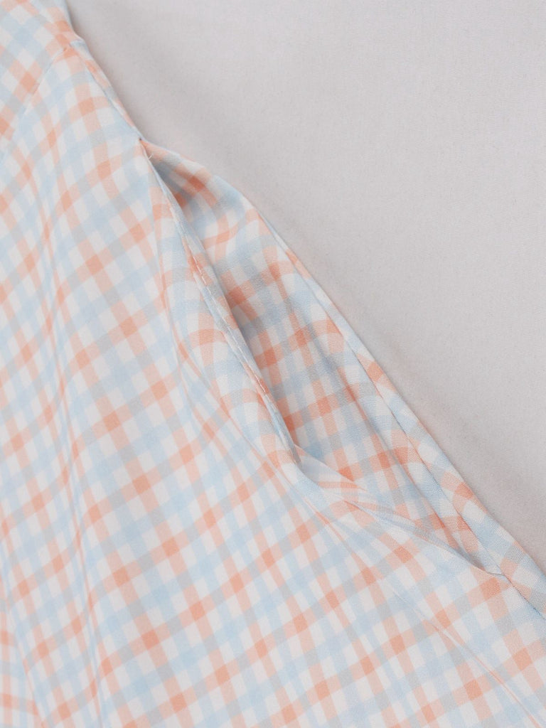 Robe blanche à bretelles spaghetti et carreaux vichy des années 1950