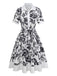 Robe chemise noire blanc à fleurs et ceinture des années 1940