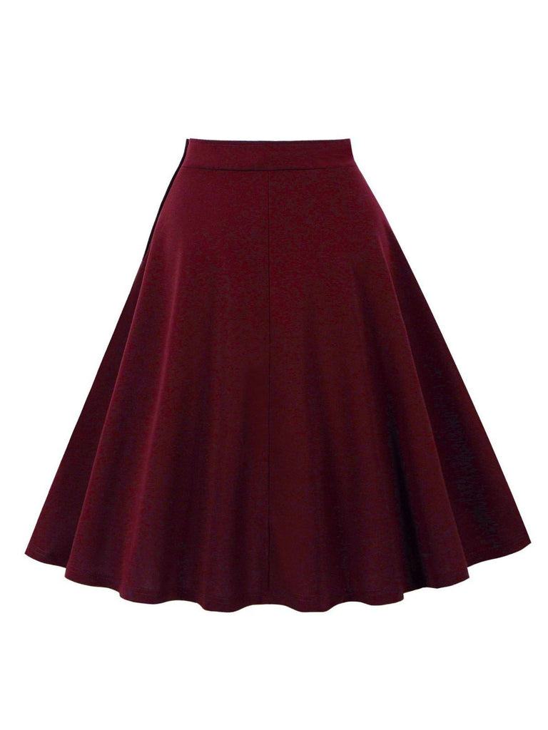 Jupe à poches et boutons latéraux unis des années 1950