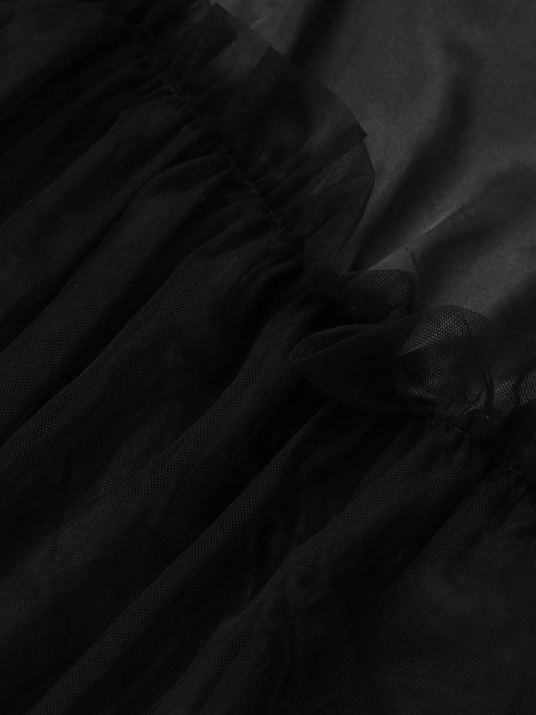 Robe noire patchwork en maille Halloween des années 1980 avec cape