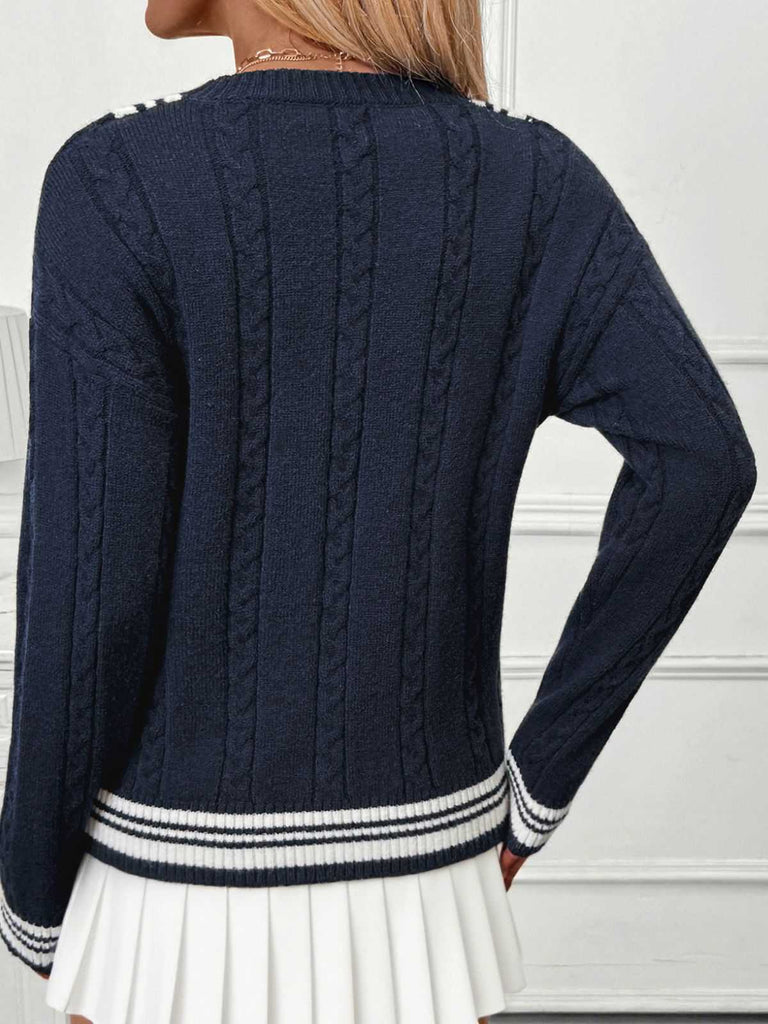 Pull rayé bleue à col en V en maille style nautique années 1950