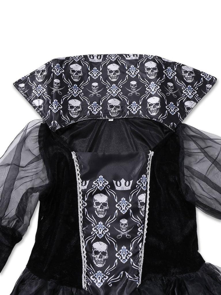 Robe noire en maille à manches longues avec tête de mort des années 1980