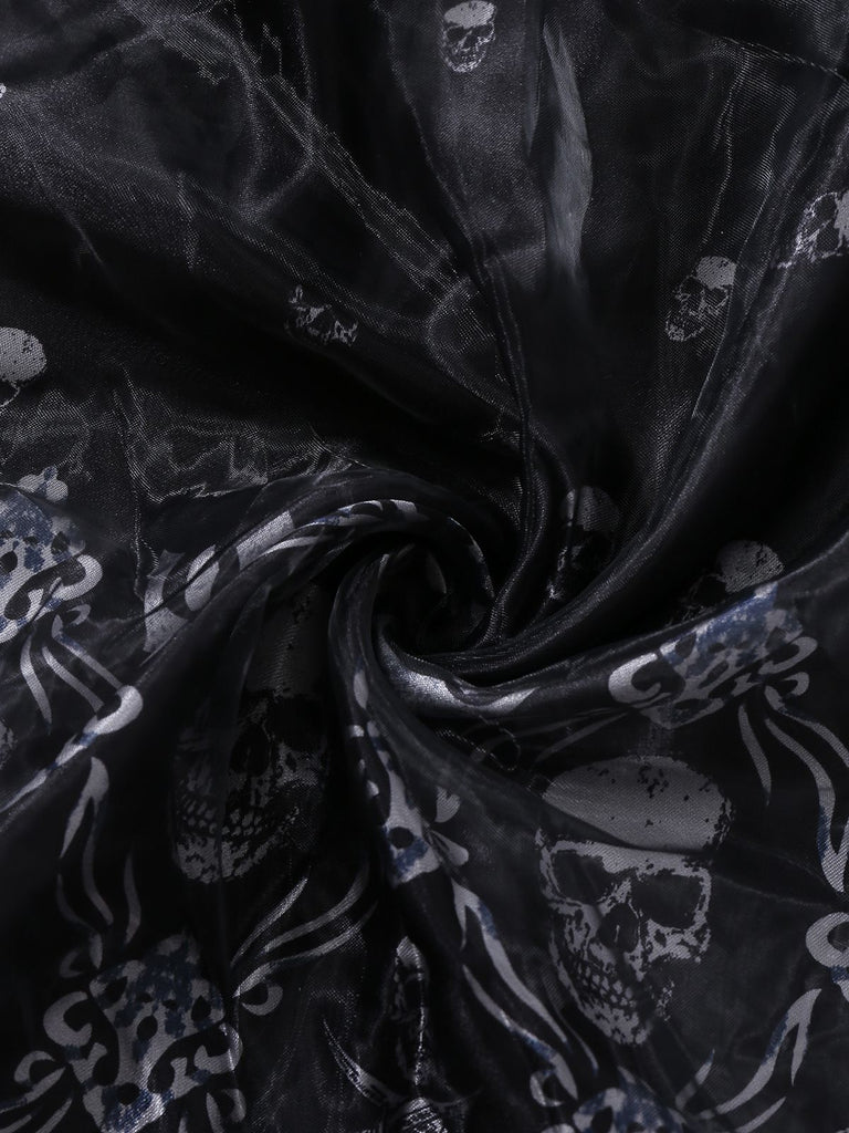 Robe noire en maille à manches longues avec tête de mort des années 1980