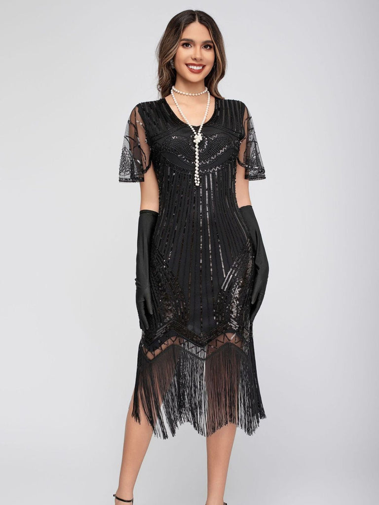 Robe Charleston à paillettes et pompons col rond années 1920