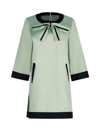 Robe trapèze verte à nœud inspirée de The Queen's Gambit des années 1970