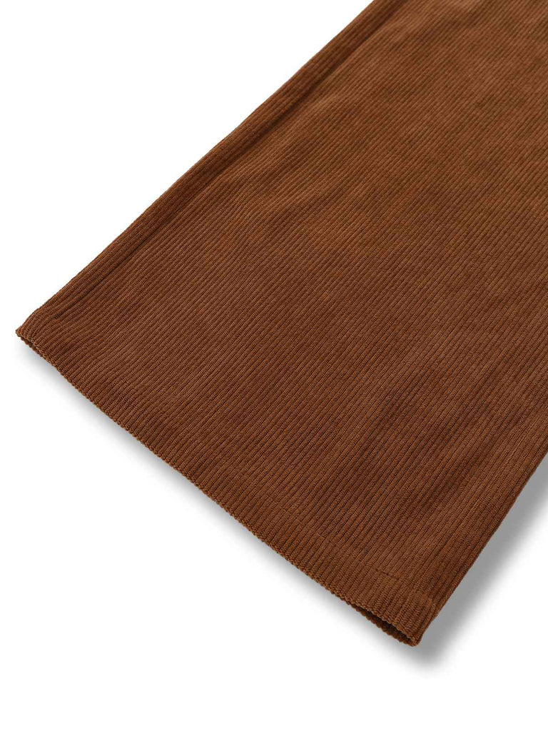 Combinaison orange col noué en velours côtelé motif marguerites années 1970