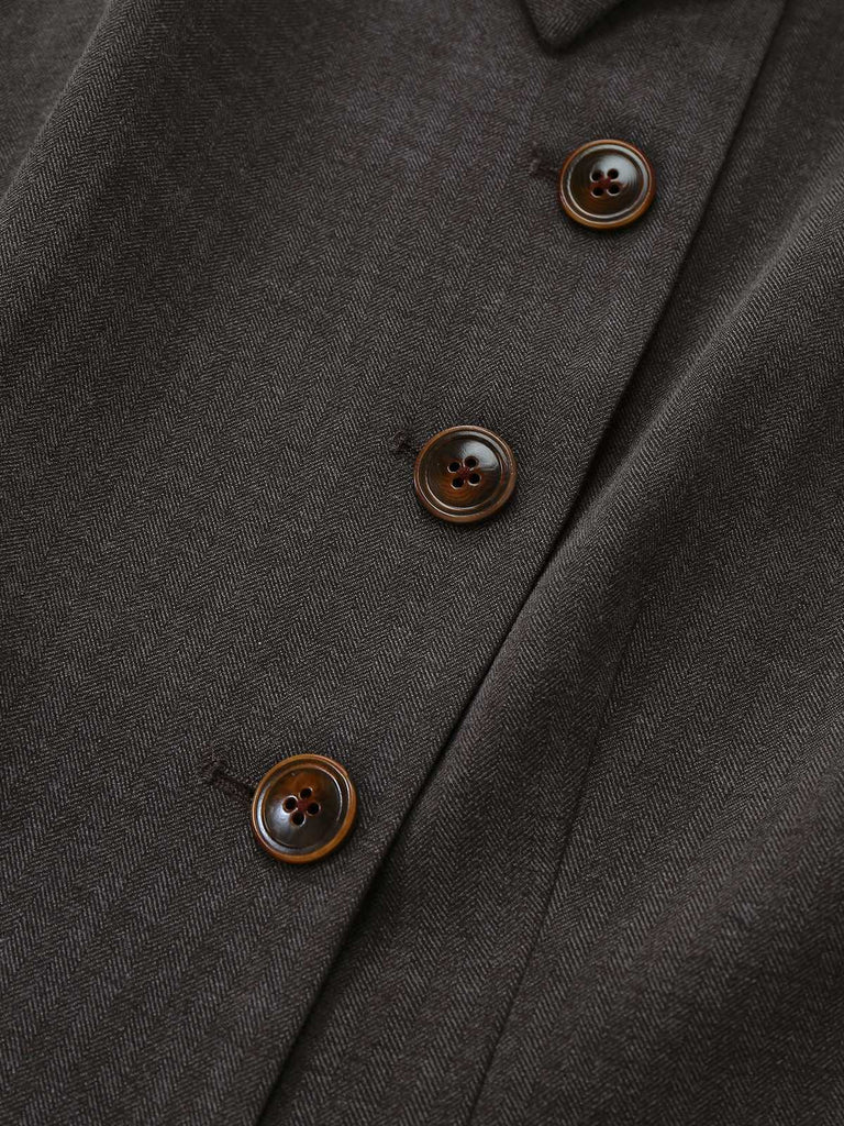 Veste à revers avec cape amovible et ceinturée années 1940