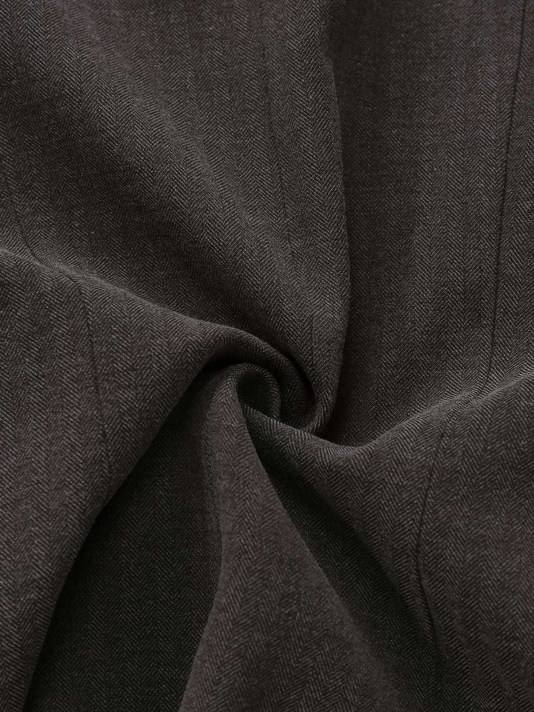 Veste à revers avec cape amovible et ceinturée années 1940