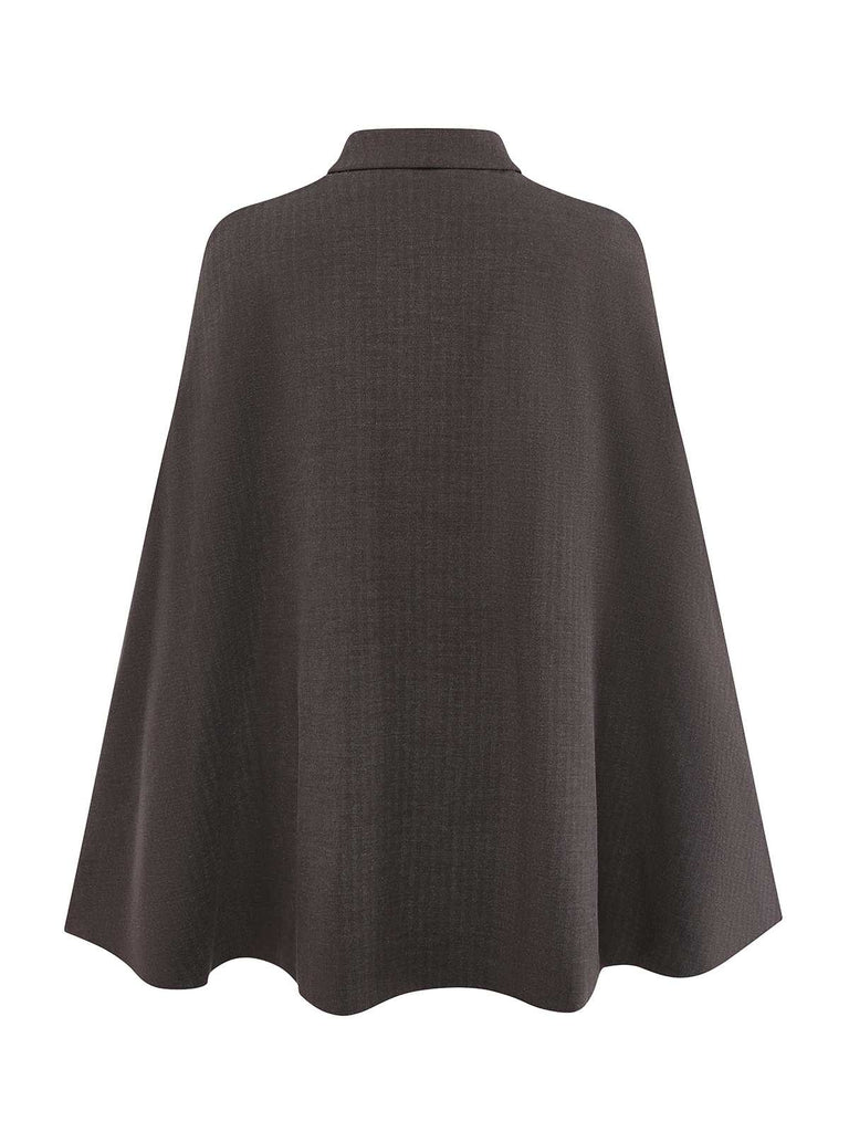 Veste à revers avec cape amovible et ceinturée années 1940