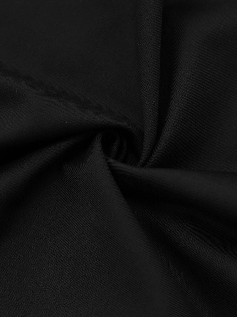 Jupe unie noire à décor de nœud années 1950