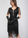 Robe de charleston manches courtes paillettes et franges des années 1920
