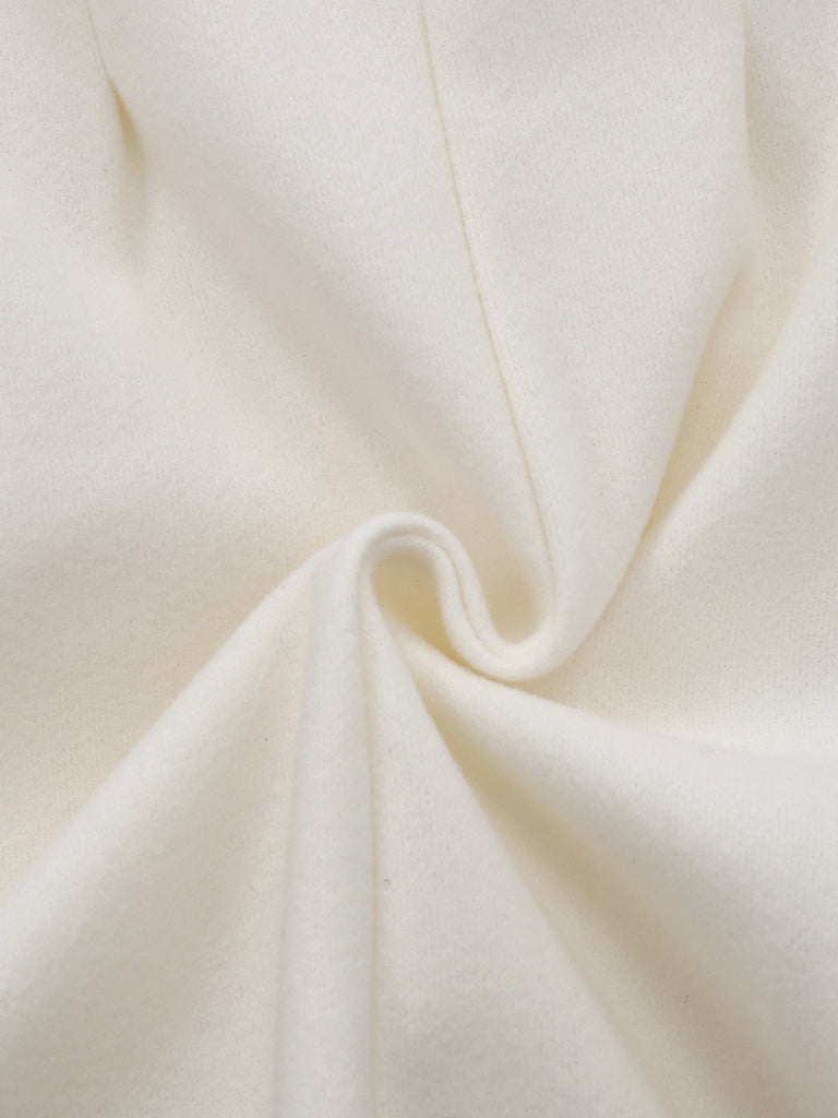 Manteau blanche en fausse laine à boutons nacrés années 1940