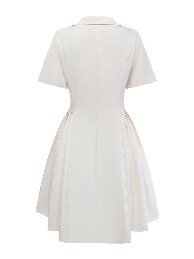 Robe beige plissée  double boutonnage et revers années 1970