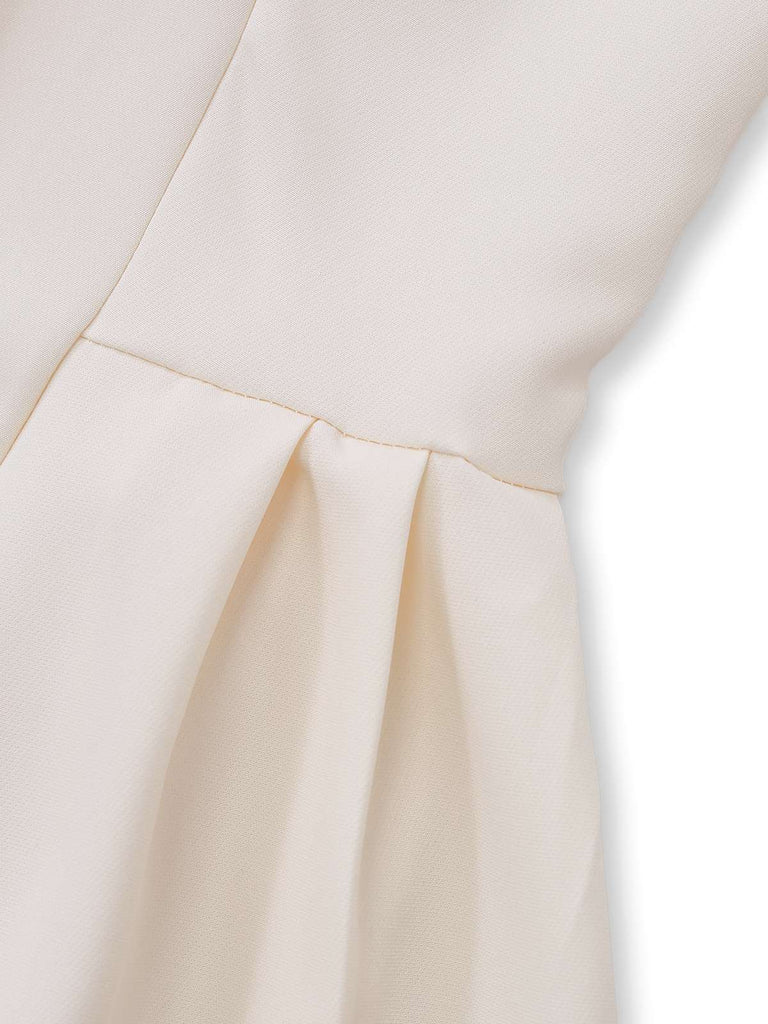 Robe beige plissée  double boutonnage et revers années 1970