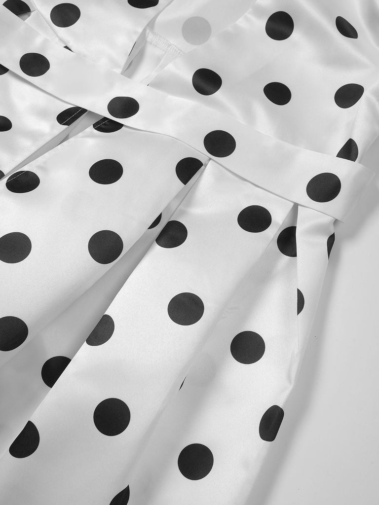 Robe cache-cœur à pois ceinturée et col en V années 1950