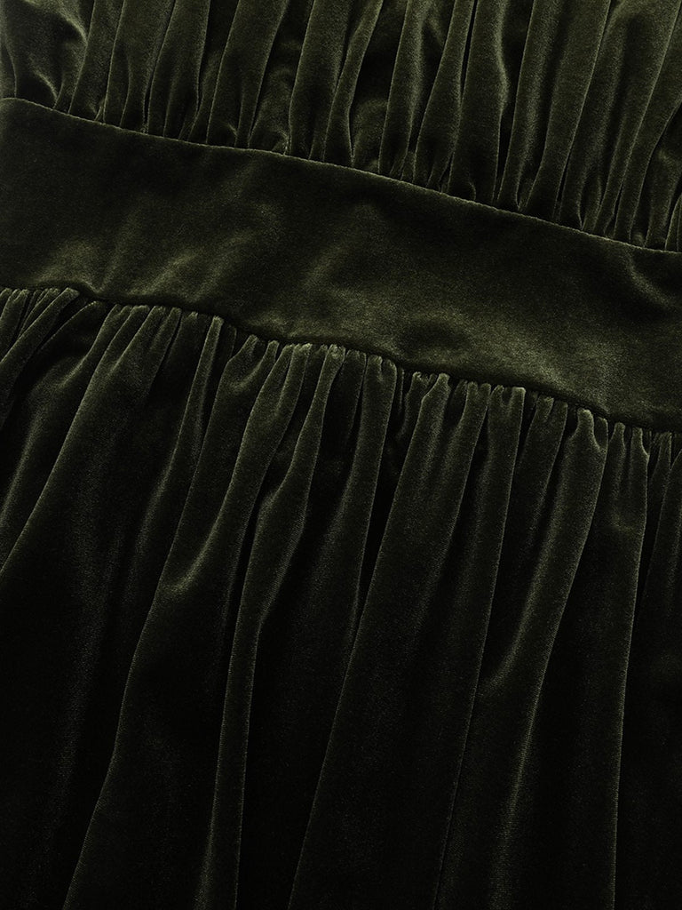 Robe verte en velours manches bouffantes col en V profond et froncées des années 1940