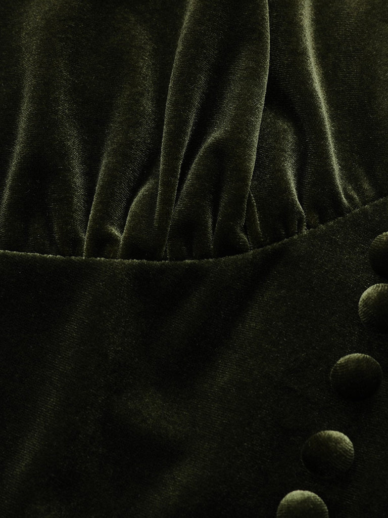 Robe verte en velours manches bouffantes col en V profond et froncées des années 1940
