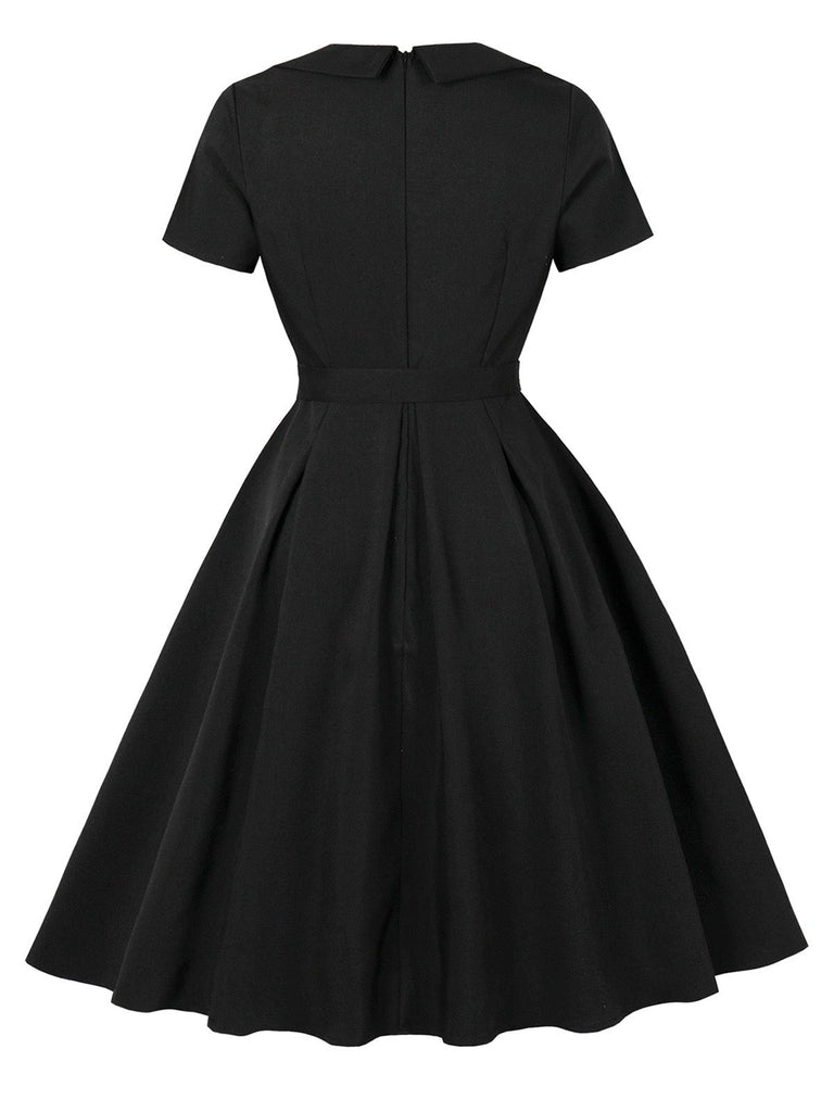 Robe trapèze noire unie col revers en forme de rose 3D des années 1950