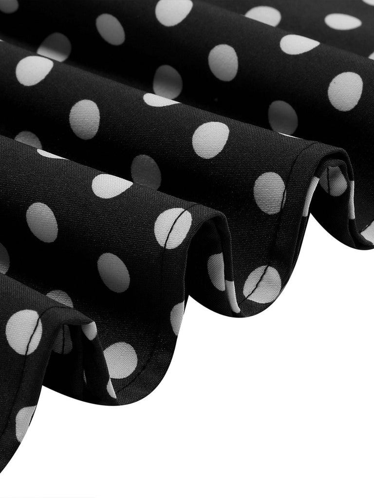 Robe trapèze à pois col nœud manches cape des années 1950