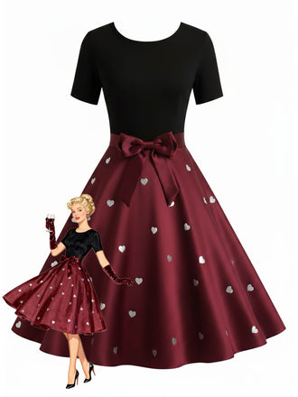 Robe trapèze noire et rouge à nœud imprimé cœur cœur années 50