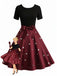 Robe trapèze noire et rouge à nœud imprimé cœur cœur années 50