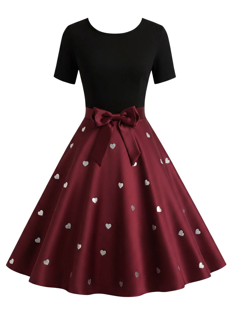 Robe trapèze noire et rouge à nœud imprimé cœur cœur années 50
