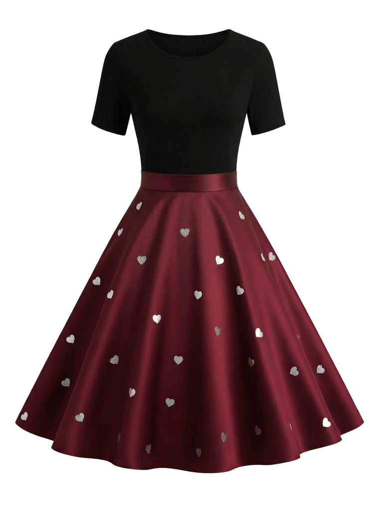 Robe trapèze noire et rouge à nœud imprimé cœur cœur années 50