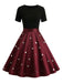 Robe trapèze noire et rouge à nœud imprimé cœur cœur années 50