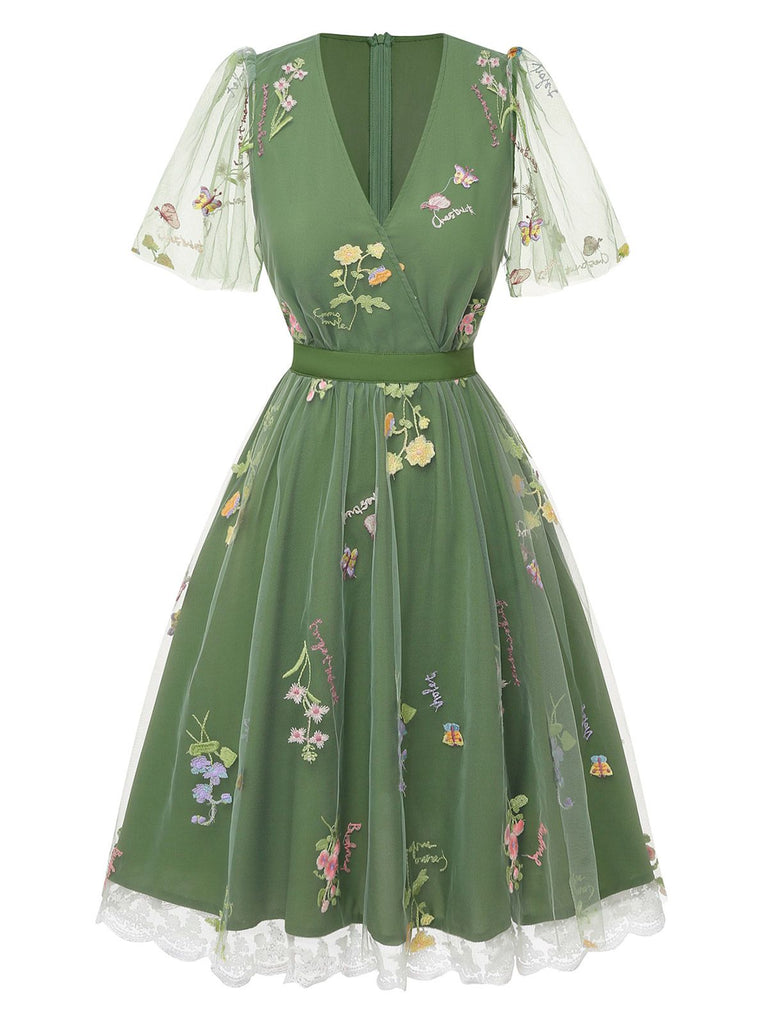 Robe verte manches bouffantes et broderies florales en résille années 50