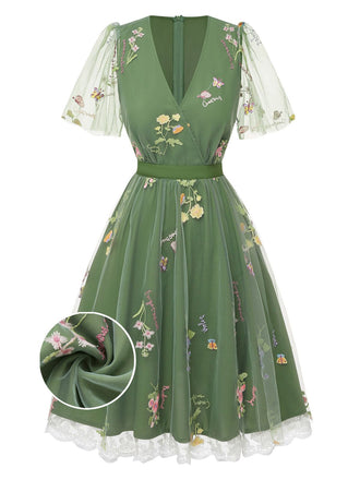 Robe verte manches bouffantes et broderies florales en résille années 50