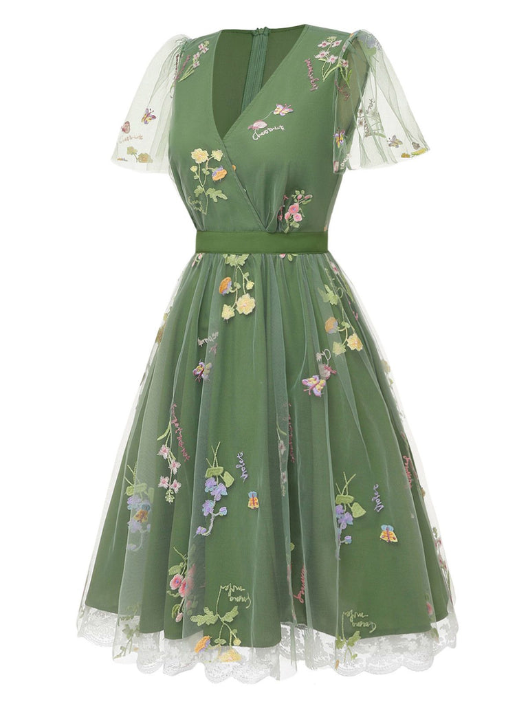 Robe verte manches bouffantes et broderies florales en résille années 50