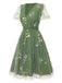 Robe verte manches bouffantes et broderies florales en résille années 50