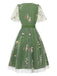 Robe verte manches bouffantes et broderies florales en résille années 50
