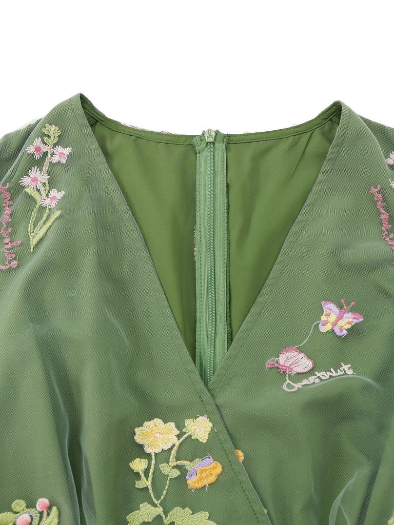Robe verte manches bouffantes et broderies florales en résille années 50