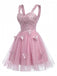 Robe courte rose à paillettes et papillons années 60