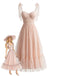 Robe rose foncé pois suisses et manches bouffantes années 1950