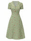 Robe vert à manches bouffantes et revers fleuris années 1940