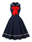Robe swing sans manches marin nœud rouge années 1950