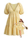 Robe babydoll jaune col V et manches bouffantes années 1950