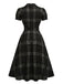 [Prévente] Robe noire à carreaux, col à revers, manches bouffantes et ceinture Années 1950 - 3