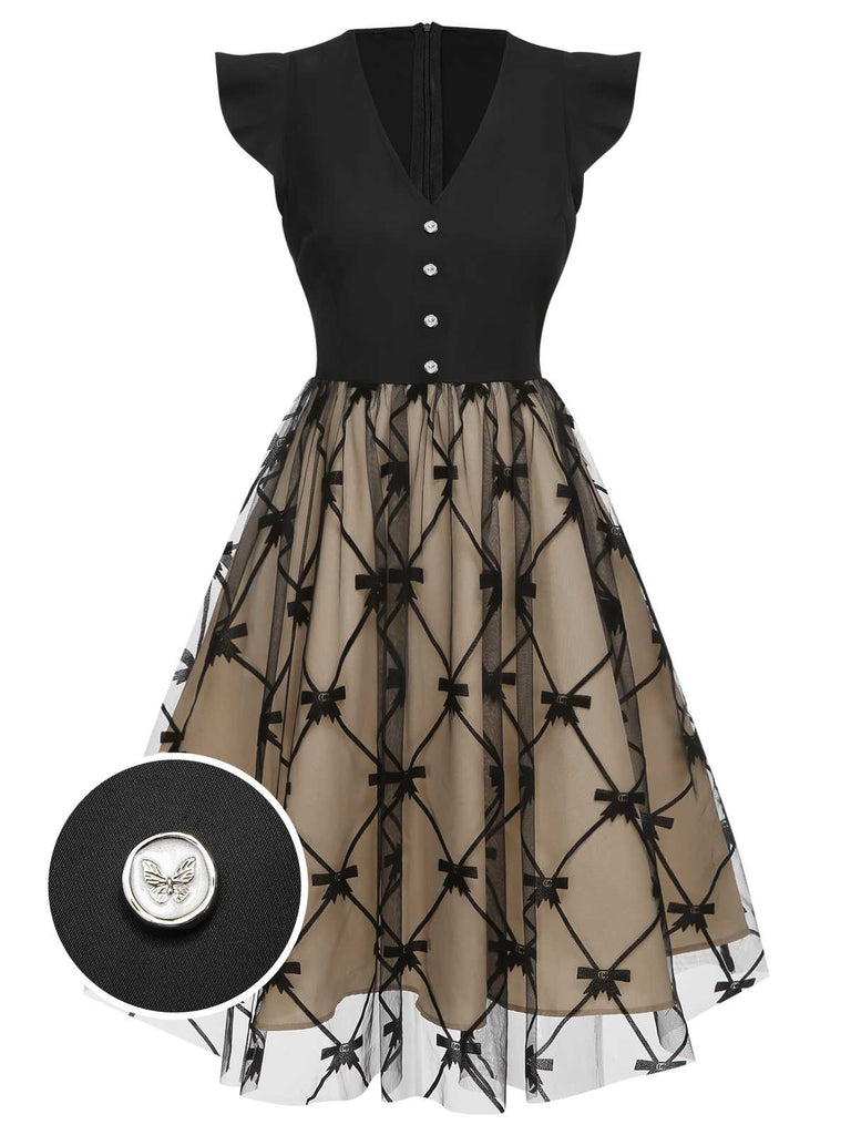 Robe noire en maille à nœud et col en V des années 1950