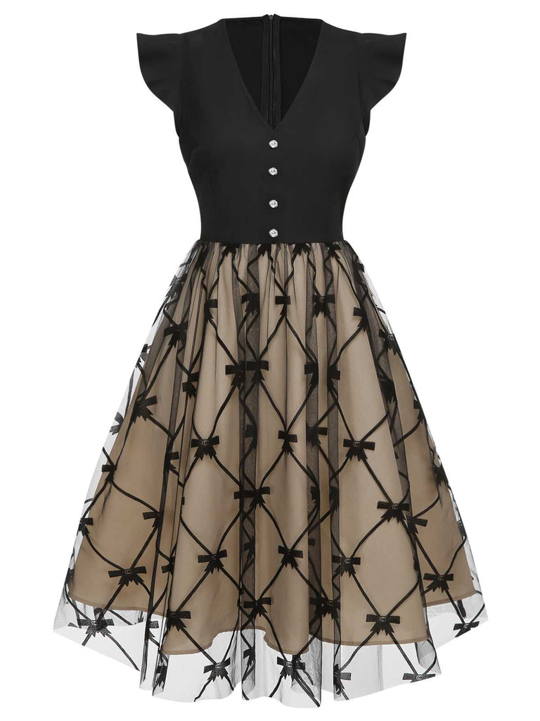 Robe noire en maille à nœud et col en V des années 1950