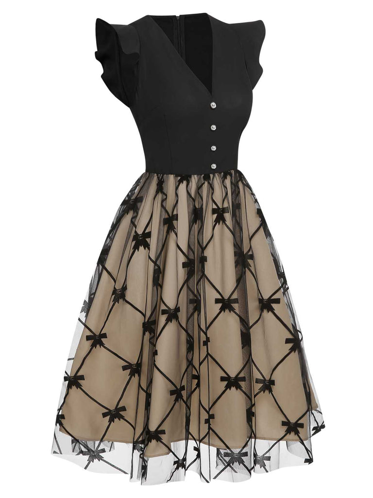 Robe noire en maille à nœud et col en V des années 1950