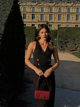 Combinaison noire boutonnée sans manches des années 1950