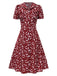 Robe marguerite à boutons revers rouge des années 1950