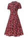 Robe marguerite à boutons revers rouge des années 1950
