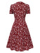 Robe marguerite à boutons revers rouge des années 1950
