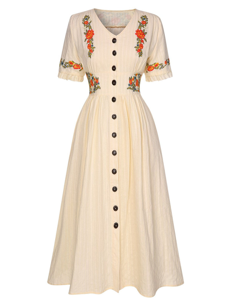 Robe fleurie brodée en coton noire à col en V des années 40
